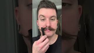 How to trim a handlebar mustache Putting in mustache wax first helps a lot [upl. by Seaman162]