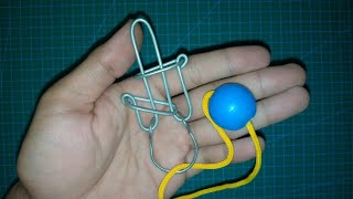 Metal wire and string puzzle solution [upl. by Joselow]