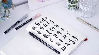 BRUSH PEN LETTERING COM CANETAS PONTA PINCEL DA SAKURA resenha  Marina Agostini [upl. by Aer366]