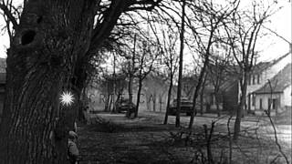 US troops search for German defenders in Haguenau France during World War II HD Stock Footage [upl. by Aseretairam]