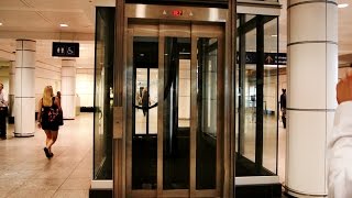 Epic Priceless amp Amazing inground hydraulic glass elevators  Montreal Trudeau Airport YUL [upl. by Mellins41]