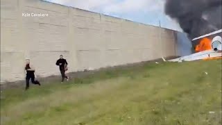 Survivors run from plane wreckage on I75 [upl. by Bekki]